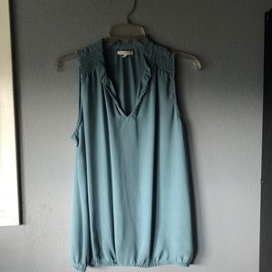 Large blue Maurice’s blouse no sleeves